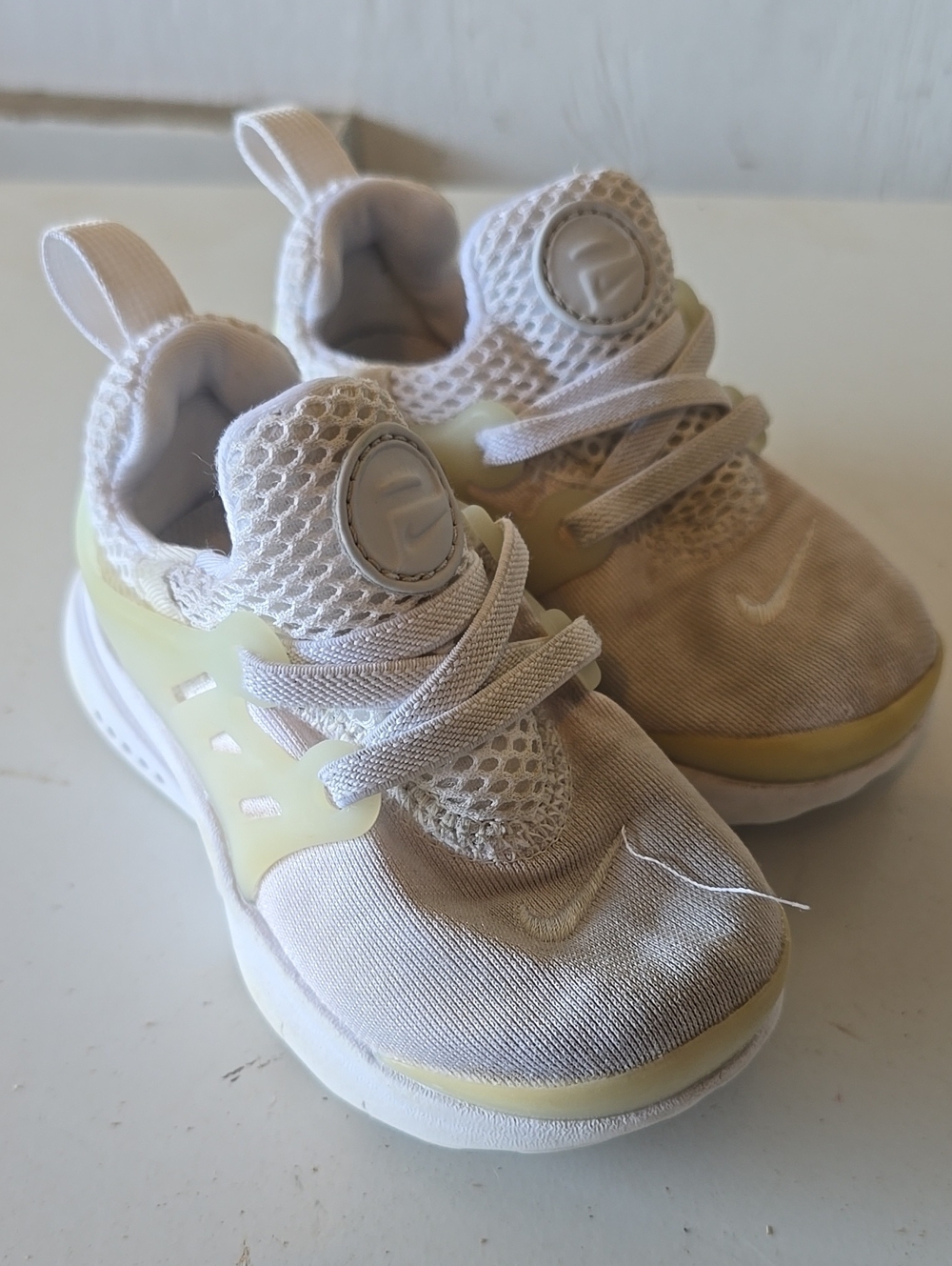 Nike Toddler Beige and Pale Yellow Slip-On Athletic Sneakers